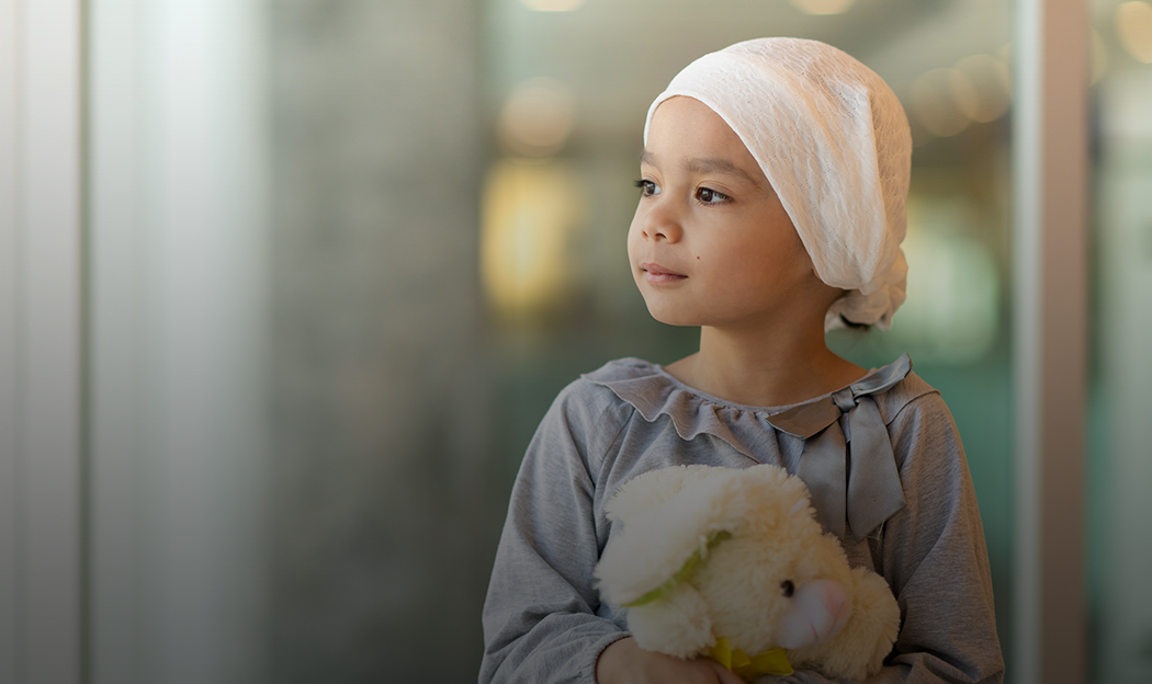 Girl holding a stuffed bunny