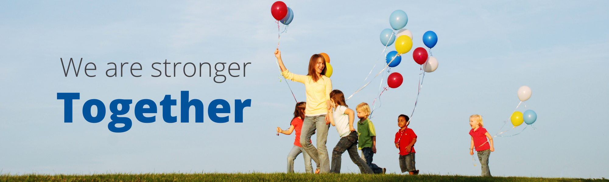 An adult leads a group of children, all hold balloons. The text overlaid on the image reads "We are Stronger Together."