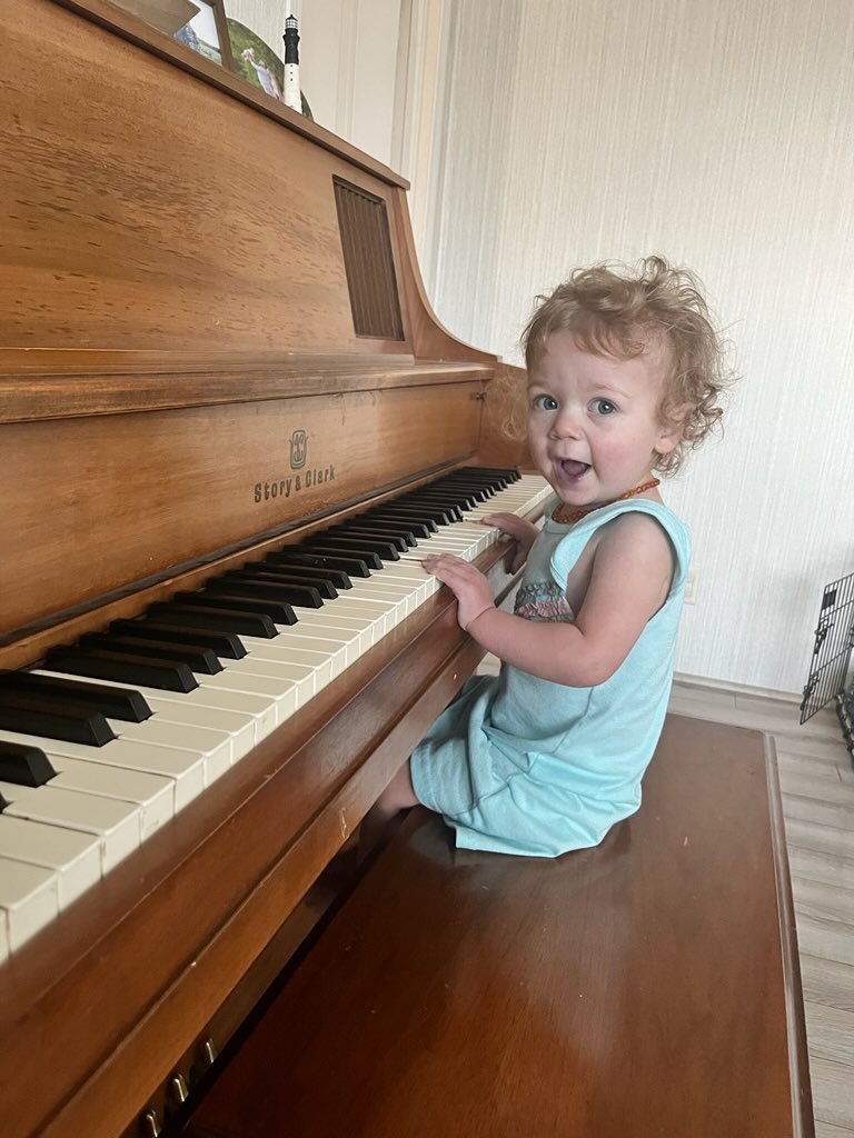 Little Miley at the piano