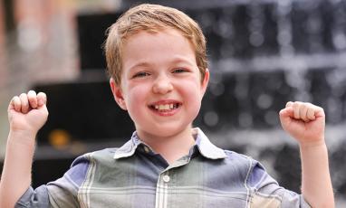 A photo of Braeden, an 8-year-old white boy.