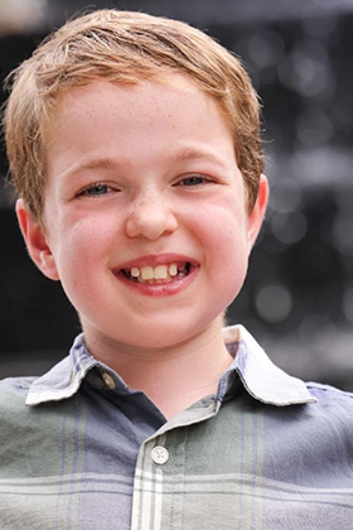 A photo of Braeden, an 8-year-old white boy. 